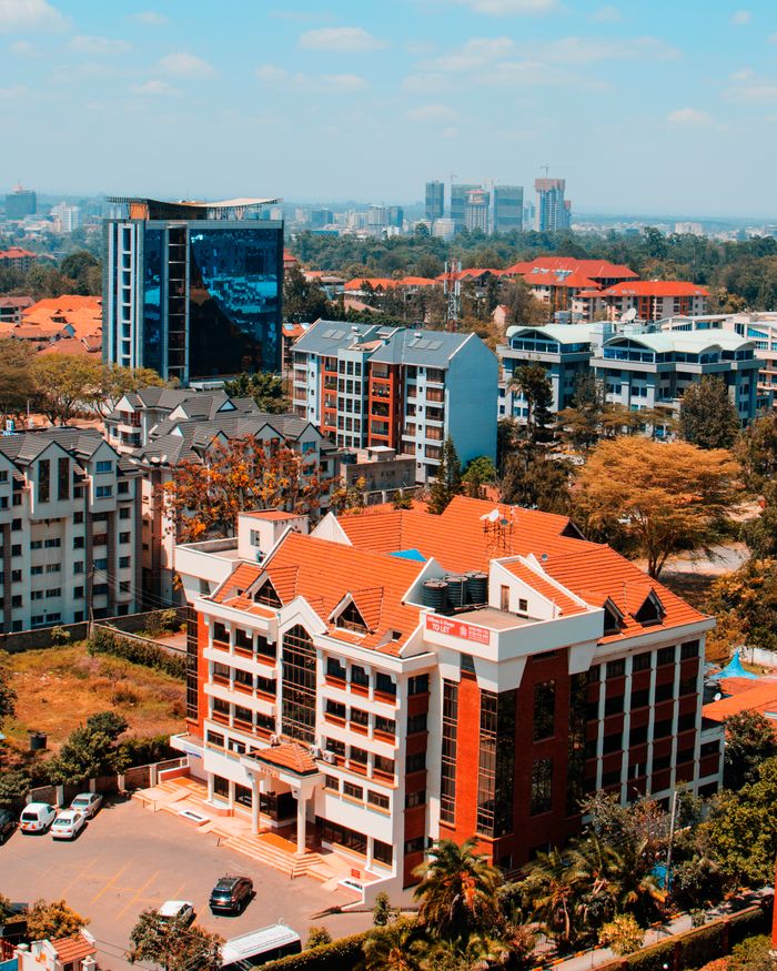 about-02 Explore the vibrant cityscape of Nairobi from above, showcasing diverse architecture.